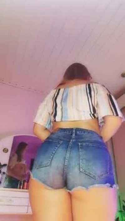 I m a nerdy girl with a huge juicy butt who sometimes likes to walk around the house in these super tight shorts See how I put these tight shorts on this massive butt It costs some effort Heh