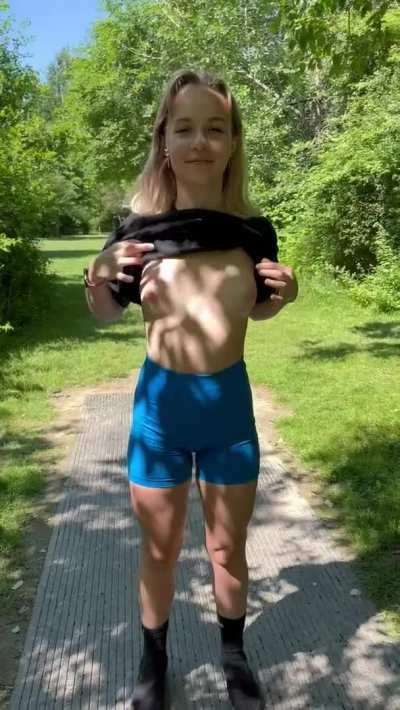 I love flashing my perky tits at the park